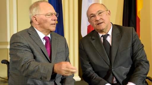 Wolfgang Schäuble ( à gauche) et Michel Sapin ( à droite) ce lundi 7 avril.