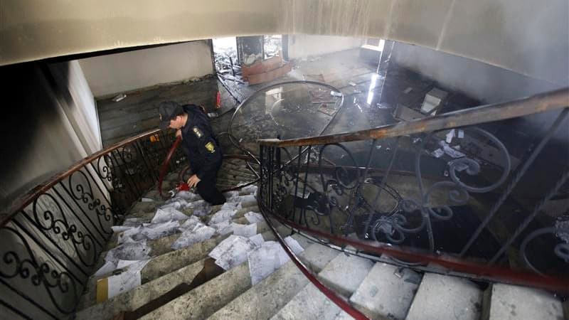 Des manifestants égyptiens ont incendié des bâtiments au Caire (photo) et tenté en vain de perturber le trafic sur le canal de Suez, après les décisions rendues par la justice en liaison avec le drame survenu en février 2012 dans le stade de Port-Saïd. /P
