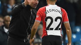 Pep Guardiola et Nathan Redmond