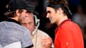 Lucas Pouille salué par Roger Federer