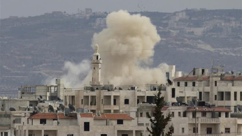 Lors du pilonnage dce la ville d'Idlib par l'armée syrienne, au début du mois. Plus de 9.000 civils ont été tués en Syrie depuis le début, il y a un an, du soulèvement prodémocratique et de sa répression par le régime de Bachar al Assad, selon les Nations