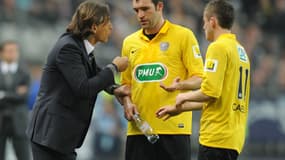 Régis Brouard et ses joueurs de Quevilly, en 2012