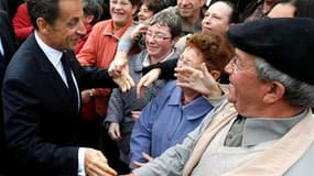 Nicolas Sarkozy, dans le petit village bourguignon de Montillot. Au plus bas dans les sondages à 18 mois de l'élection présidentielle de 2012, le chef de l'Etat a poursuivi jeudi au coeur de la France rurale sa campagne pour tenter de reconquérir une opin