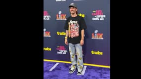 Antoine Griezmann prend la pose pour les photographes avant le SuperBowl 2025, le 9 février, à la Nouvelle Orléans