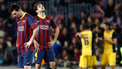 L'attaquant Lionel Messi et le milieu de terrain du FC Barcelone Cesc Fabregas ce mardi 1er avril à Barcelone, lors du quart de finale aller de la Ligue des Champions.