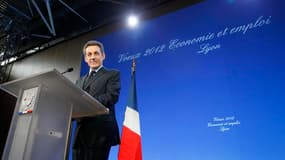En visite près de Lyon, jeudi, Nicolas Sarkozy a dénoncé ceux qui déconseillent à la France d'instaurer seule une taxe sur les transactions financières, ou taxe "Tobin", et a reproché à ses partenaires européens d'être hostile à cette mesure. /Photo prise