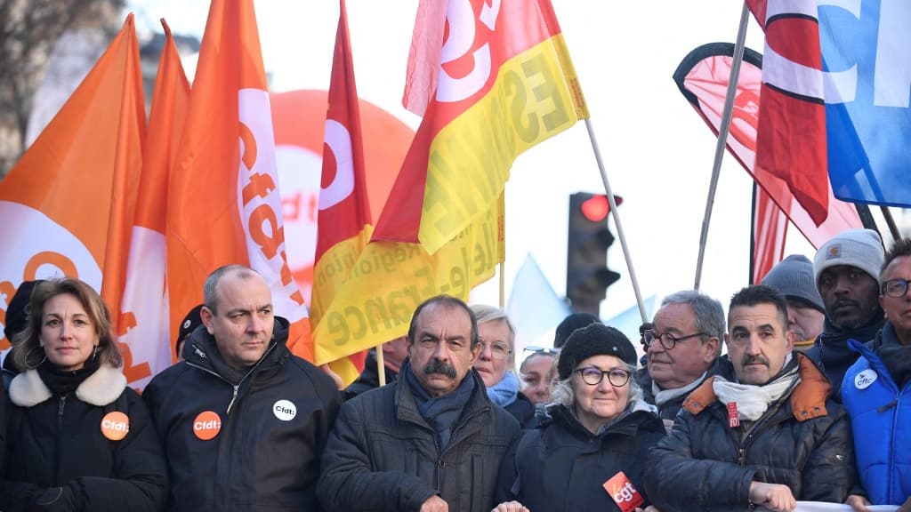 Laurent Berger et Philippe Martinez, Frédéric Souillot à la manifestation contre la réforme des retraites, à Paris, le 7 février 2023. 