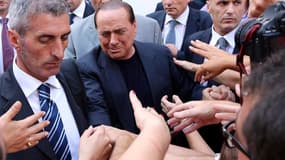 A Rome, manifestation des partisans de Silvio Berlusconi qui protestent contre la confirmation par la Cour de cassation de la peine de quatre de prison ferme infligée à l'ancien président du Conseil italien pour fraude fiscale. /Photo prise le 4 août 2013