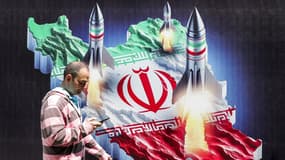 Un homme passe devant une banderole représentant des missiles lancés depuis une représentation de la carte de l'Iran colorée avec le drapeau iranien dans le centre de Téhéran, le 15 avril 2024