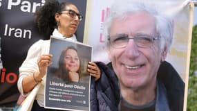 Les portraits de Cécile Kohler et de son compagnon Jacques Paris détenus en Iran, lors d'une manifestion pour leur libaration à Paris le 14 mai 2023
