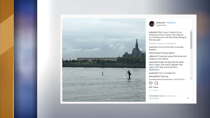 Scott Holt en train de traverser l'Hudson en paddle et costume, jeudi 21 juin 2018. 