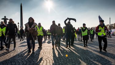 Des gilets jaunes place de la Concorde, à Paris, le 17 novembre.