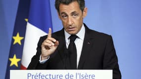 Nicolas Sarkozy, lors de son discours controversé de Grenoble en 2010, qui a marqué un tournant décisif dans sa politique.