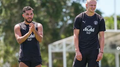 Rayan Cherki et Erling Haaland