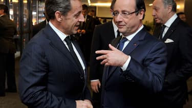 Nicolas Sarkozy et François Hollande à l'occasion des funérailles de Nelson Mandela.