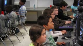 Des élèves de CM1-CM2 en cours d'informatique, aux Etats-Unis, en 2009.