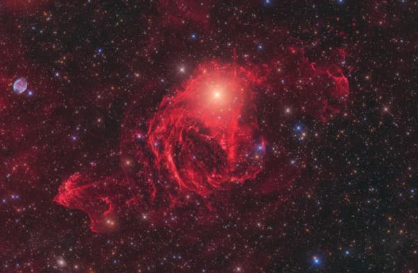 New Class of Galactic Nebulae Around the Star YY Hya

