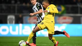 Romain Thomas et Kylian Mbappé