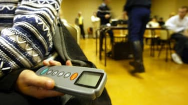 Un boîtier vibrait pour indiquer la bonne réponse au candidat au code de la route.
