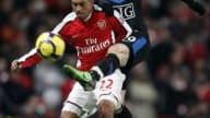 Wayne Rooney au duel avec Gaël Clichy