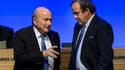 Sepp Blatter et Michel Platini, alors respectivement présidents de la Fifa et de l'UEFA, lors du 64e congrès de la Fifa, le 11 juin 2014 à Sao Paulo 