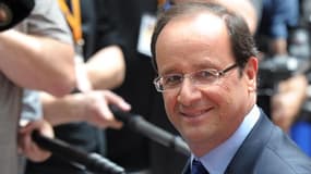 François Hollande à son arrivée à Bruxelles. Le président français a déclaré qu'il demanderait à ses partenaires européens des "solutions très rapides" pour alléger la pression des marchés financiers sur les pays de la zone euro les plus en difficulté com