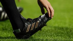 Une chaussure de foot, illustration