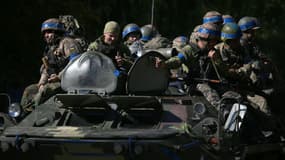Soldats ukrainiens sur un char à Donetsk, en Ukraine, le 21 septembre 2022