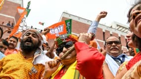 Des partisans du BJP, le parti du Premier ministre indien Narendra Modi, fêtent le résultat des votes aux législaties, le 23 mai 2019 à New Delhi