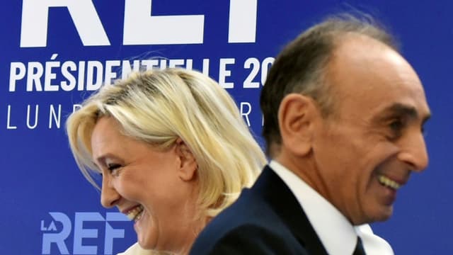 La candidate RN à la présidentielle française Marine Le Pen (g) et son adversaire Reconquête! Eric Zemmour devant 400 entrepreneurs à Paris, le 21 février 2022