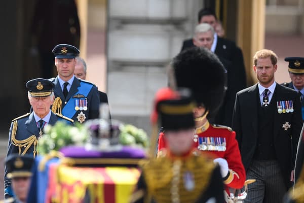 Charles, William and Harry follow the Queen's coffin on September 14, 2022