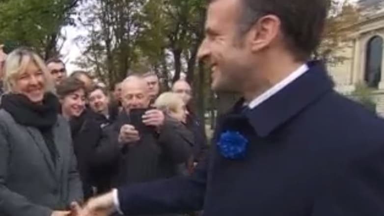 Emmanuel Macron sur les Champs-Elysées. 