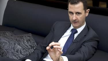 Bachar al Assad lors d'une interview en juin dernier. Les rebelles disent avoir pris pour cible jeudi le convoi du président syrien alors qu'il se rendait dans une mosquée de Damas pour la fête musulmane de l'Aïd el Fitr et la télévision publique syrienne