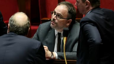 Le ministre de la Santé Aurélien Rousseau (c) à l'Assemblée nationale, le 13 décembre 2023 à Paris