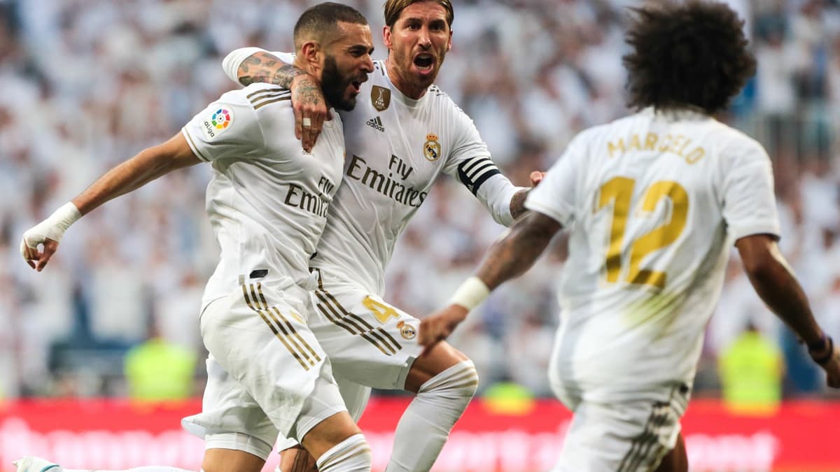 Karim Benzema (à gauche) célèbre un de ses buts avec le Real avec Sergio Ramos et Marcelo Karim Benzema (à gauche) célèbre un de ses buts avec le Real avec Sergio Ramos et Marcelo