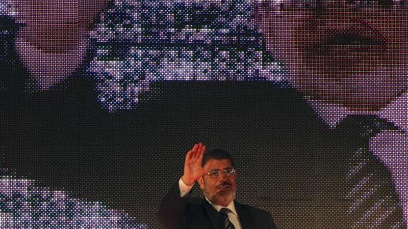 Mohamed Morsi, candidat des Frères musulmans qui serait arrivé en tête du premier tour de la présidentielle égyptienne. La confrérie islamiste s'efforce de convaincre les candidats malheureux de faire front commun au second tour contre le dernier Premier