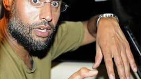 Le procureur de la Cour pénale internationale (CPI) a indiqué dimanche disposer de "preuves solides" de l'implication de Saïf al Islam Kadhafi dans des attaques visant des civils et dans le recrutement de mercenaires en Libye. /Photo prise le 23 août 2011