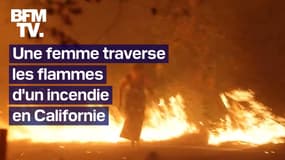 Une femme traverse les flammes d'un incendie pieds nus en Californie