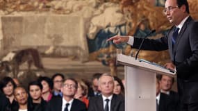 François Hollande, mardi 14 novembre, lors de sa conférence de presse à l'Elysée, devant les membres du gouvernement.