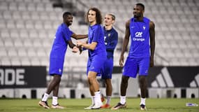 Dembélé, Guendouzi, Griezmann et M. Thuram avec les Bleus, à Doha le 20 novembre 2022