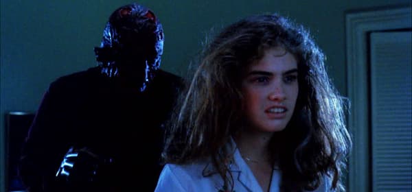 Le personnage de Nancy, "final girl" des Griffes de la Nuit, devant Freddy Krueger. 