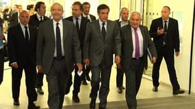 Alain Juppé, François Fillon et Jean-Pierre Raffarin à la sortie du bureau politique de l'UMP, mardi 10 juin.