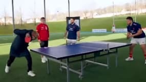 Félix Lebrun au service face à Julien Marchand sous les yeux d'Alexis Lebrun et Cyril Baille