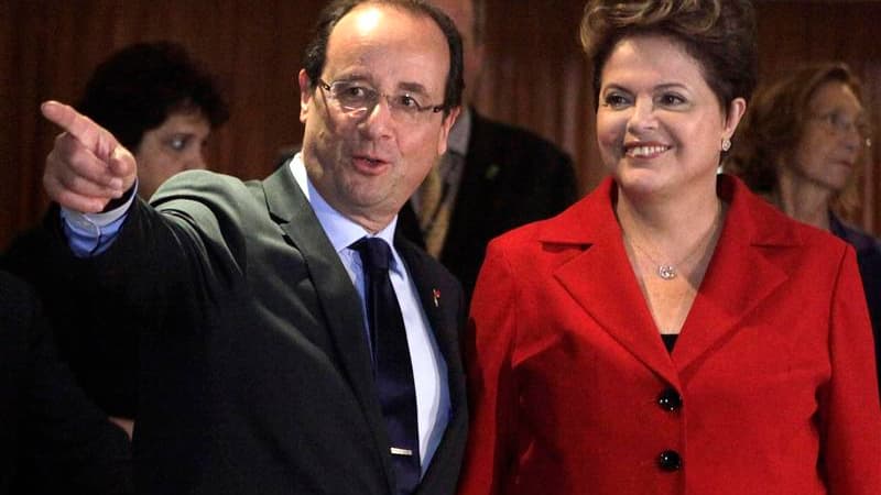 La présidente brésilienne Dilma Rousseff a accueilli mercredi sous un ciel pluvieux la centaine de chefs d'Etat et de gouvernement, dont François Hollande, venus participer au sommet de Rio+20, alors que le projet de déclaration finale suscite déjà des cr