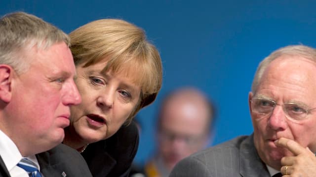 Berlin a adopté une ligne particulièrement dure vis-à-vis de la Grèce (ici la chancelière Angela Merkel, le ministre des Finances Wolfgang Schauble et Karl-Josef Laumann, un cadre de la CDU).