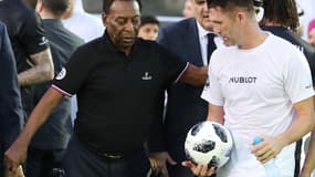 Pelé, avec Robbie Keane