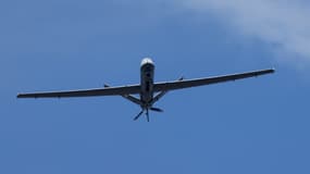 Le drone Reaper au-dessus de Paris, le 14 juillet 2022. 
