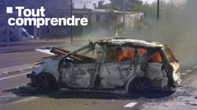 Une image tirée d'une vidéo de l'AFP publiée le 17 septembre 2024 montre une voiture en feu dans une rue de Fort-de-France, dans l'île française de la Martinique