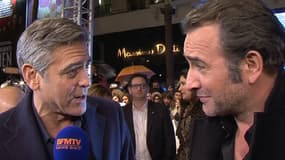 George Clooney et Jean Dujardin lors de l'avant-première parisienne de "Monuments Men", le 12 février 2014.
