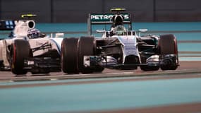 Nico Rosberg a signé la pole et compte sur Valtteri Bottas (au deuxième plan) et les Williams pour l'aider à déstabiliser Lewis Hamilton dimanche